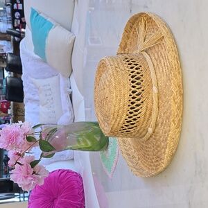 Woven Raffia hat with bent up brim and twisted beaded band